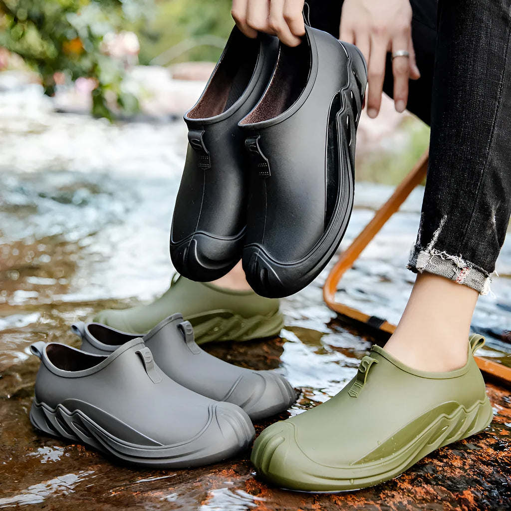 Men's short plastic rain boots in ankle-height wellington style available in multiple colours