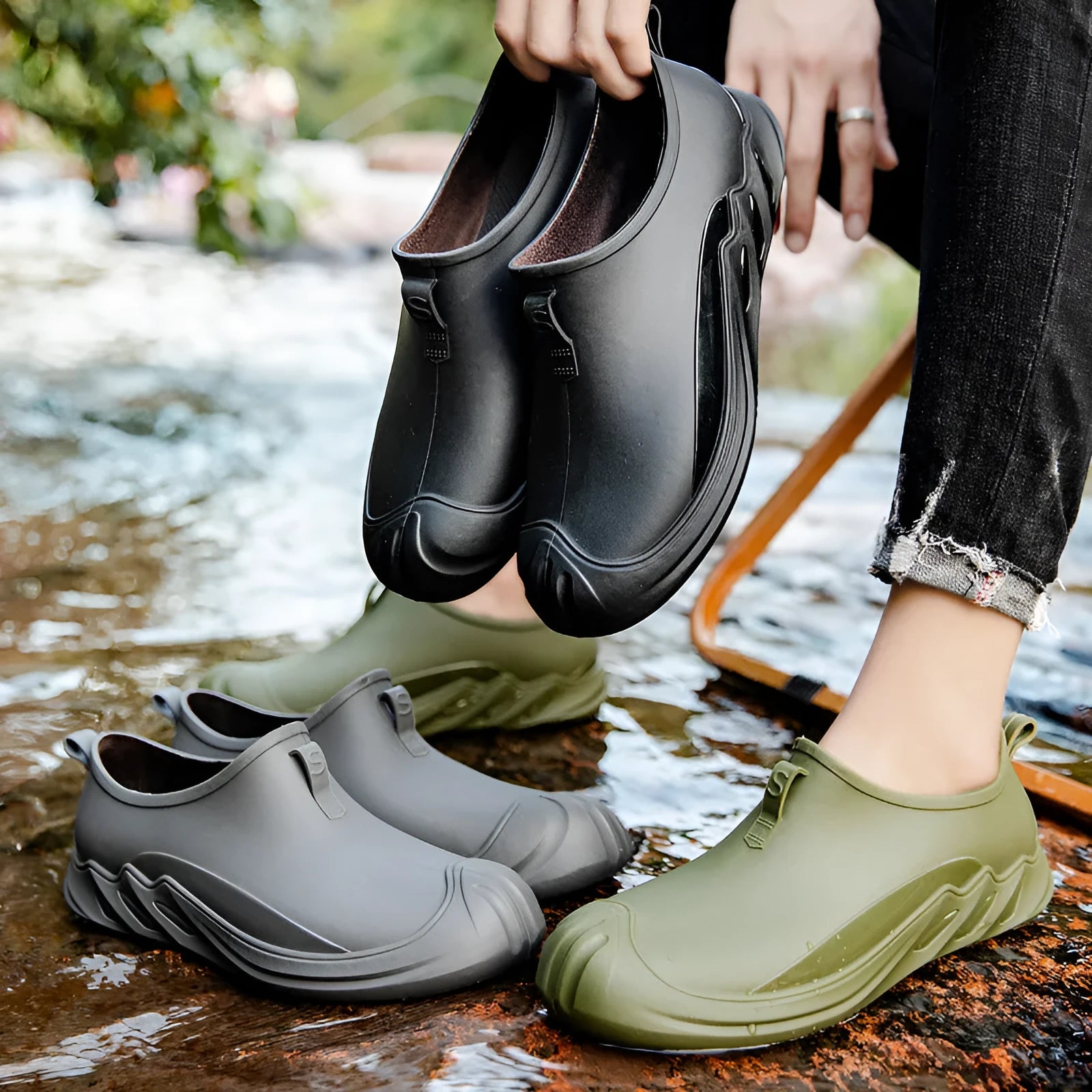 Men's short plastic rain boots in ankle-height wellington style available in multiple colours