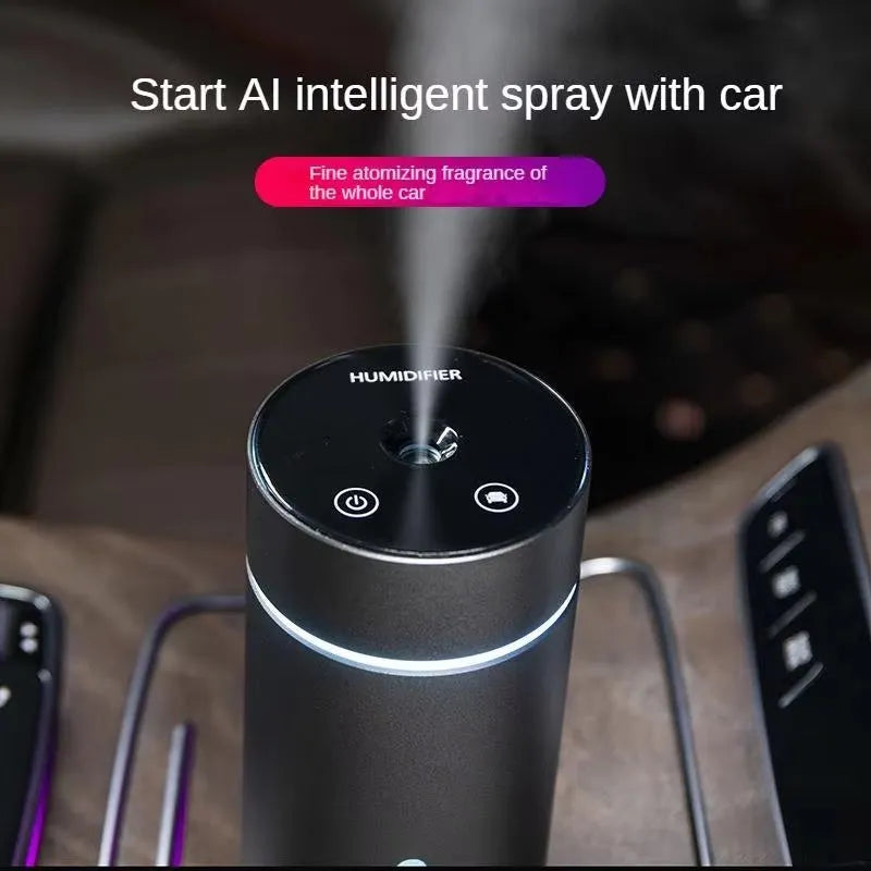 Black aluminium portable car humidifier diffuser with night light on a car dashboard