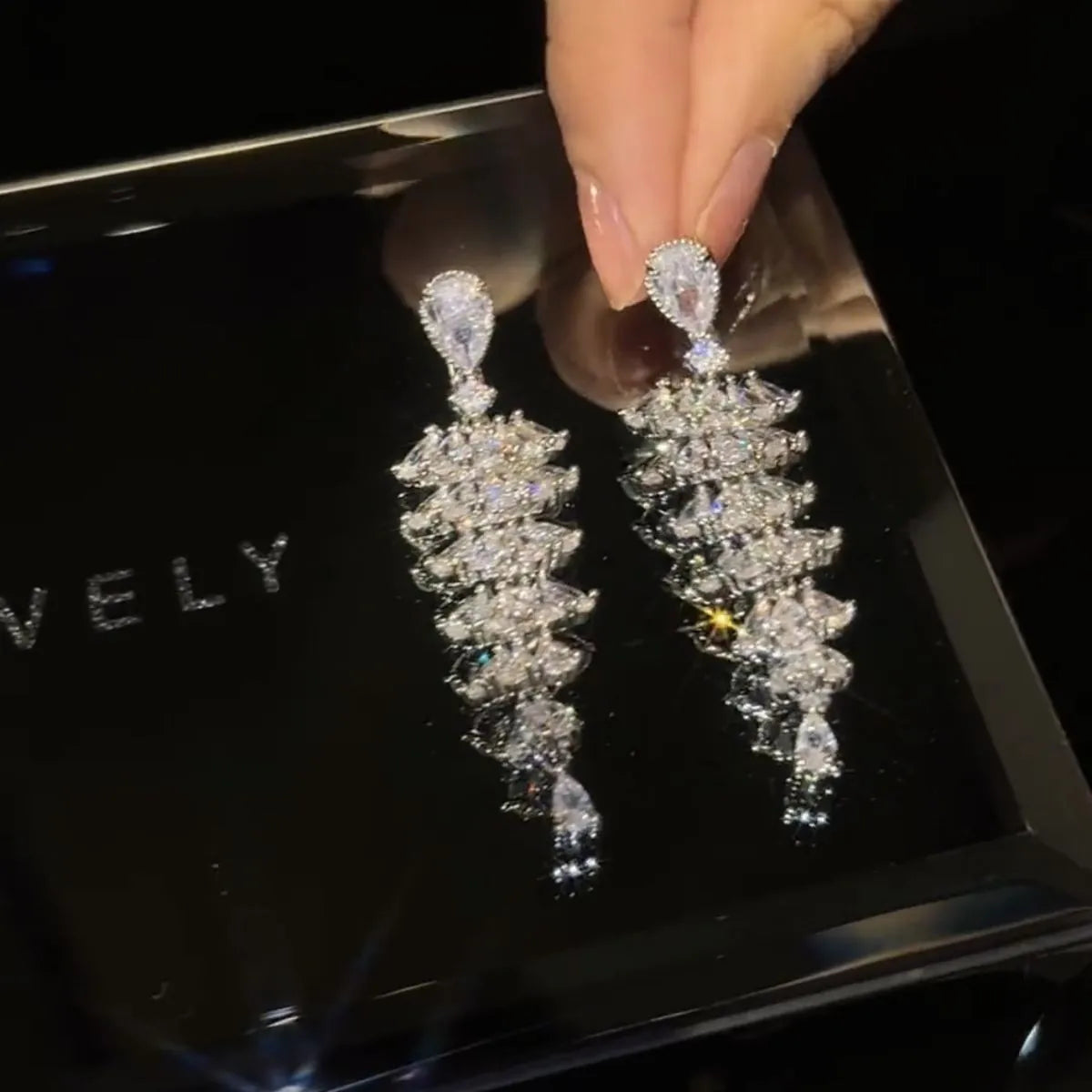 Silver pagoda Christmas tree drop earrings with sparkling zircon decoration on copper studs