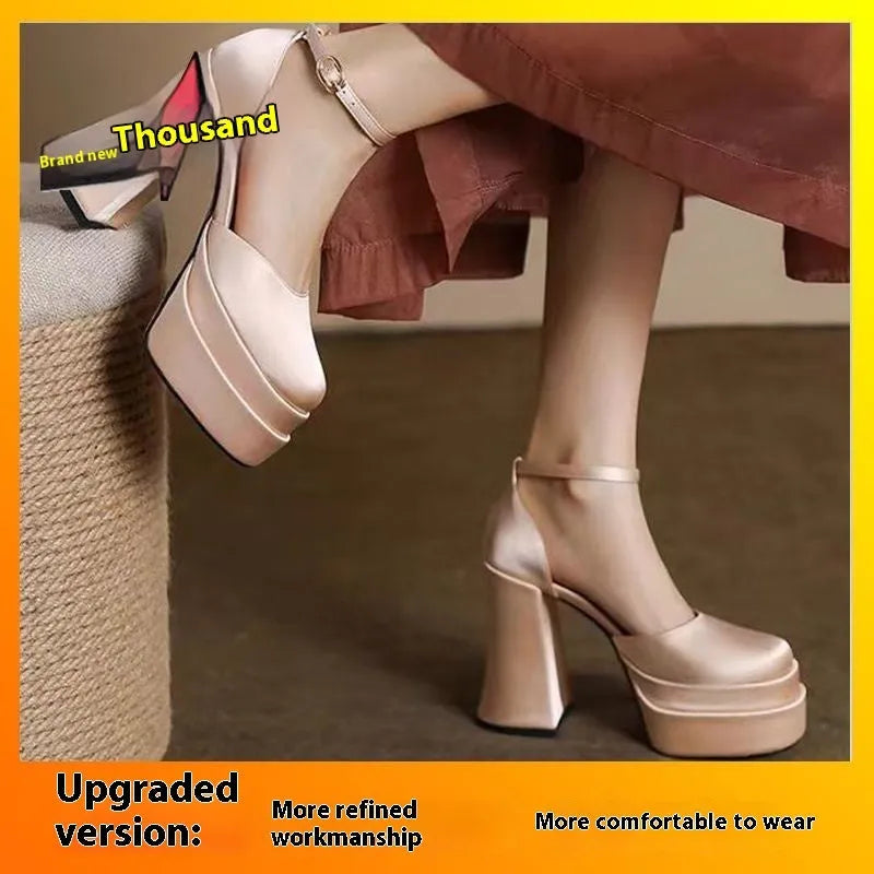 Women's white platform high heels with a chunky heel and round toe.