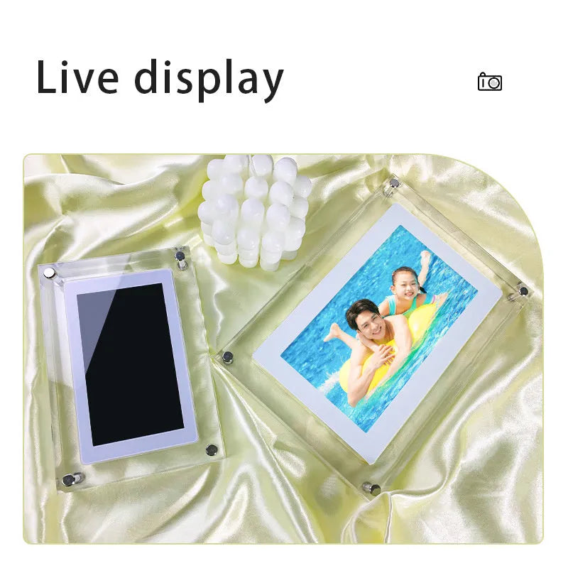 White acrylic digital picture frame showing family photos on a 5-inch vertical screen