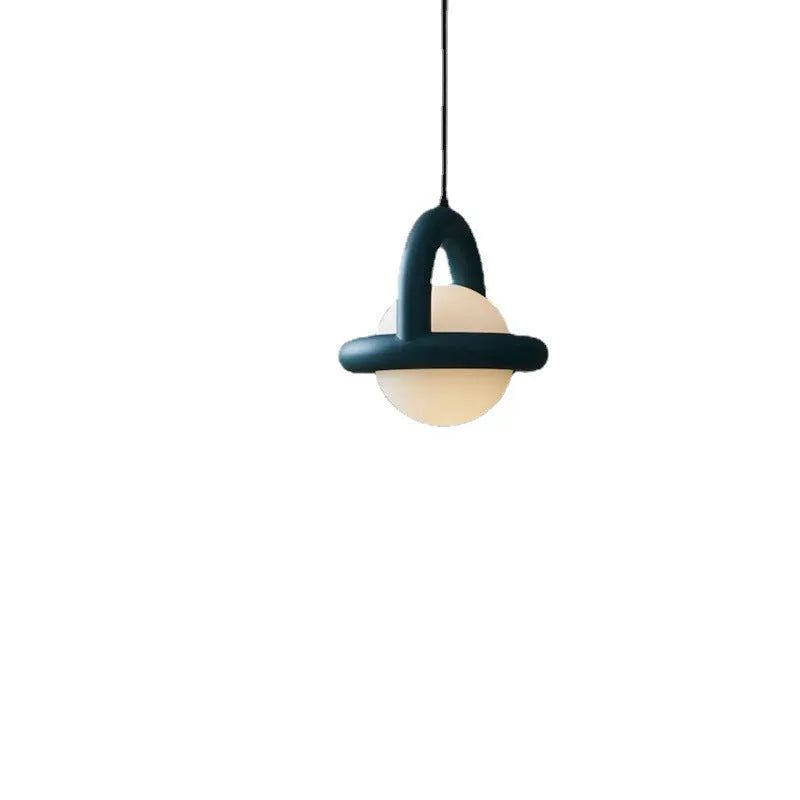 Danish designer Nordic style linear hanging pendant lamp in a choice of colours including green, mounted on a wall.