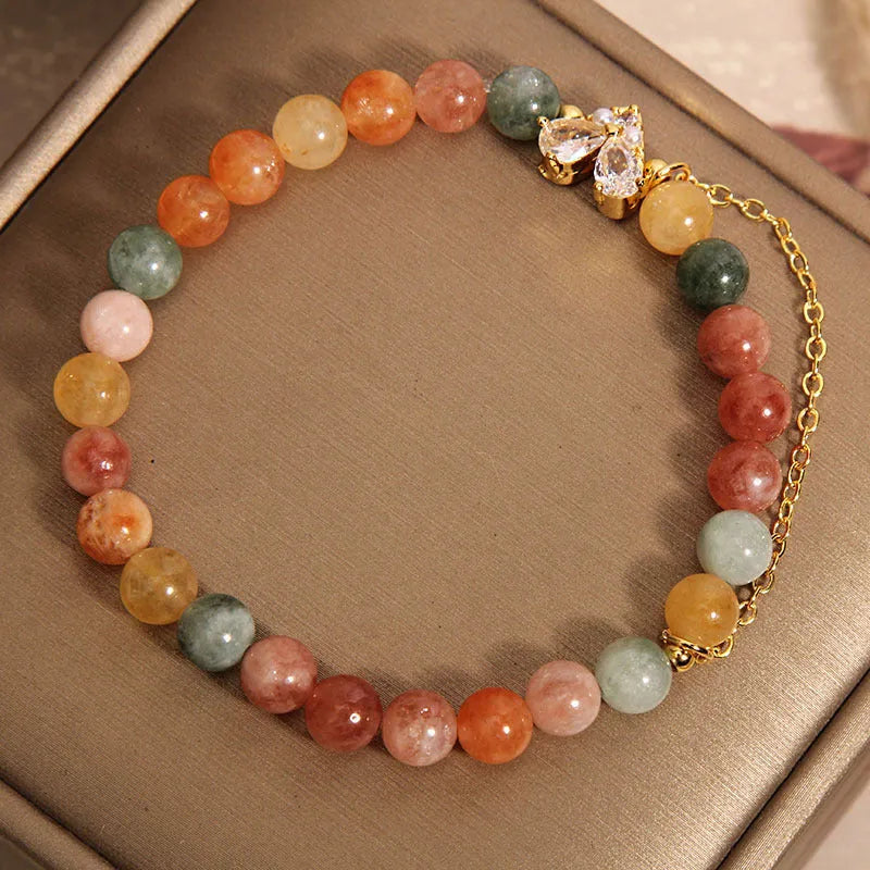 Fu Lu Shou crystal bracelet for women with gold tone metal settings and V-shaped zircon design