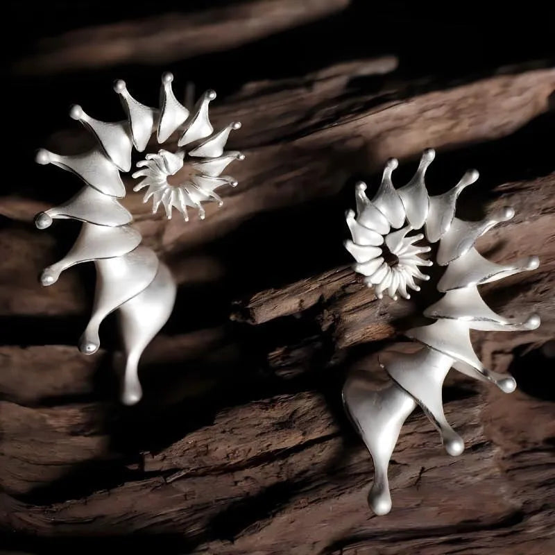 Conch colour three-dimensional matte alloy stud earrings with irregular geometric design