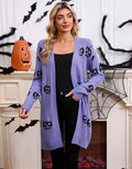 Women's black Halloween cardigan with orange pumpkin head jacquard knitting.