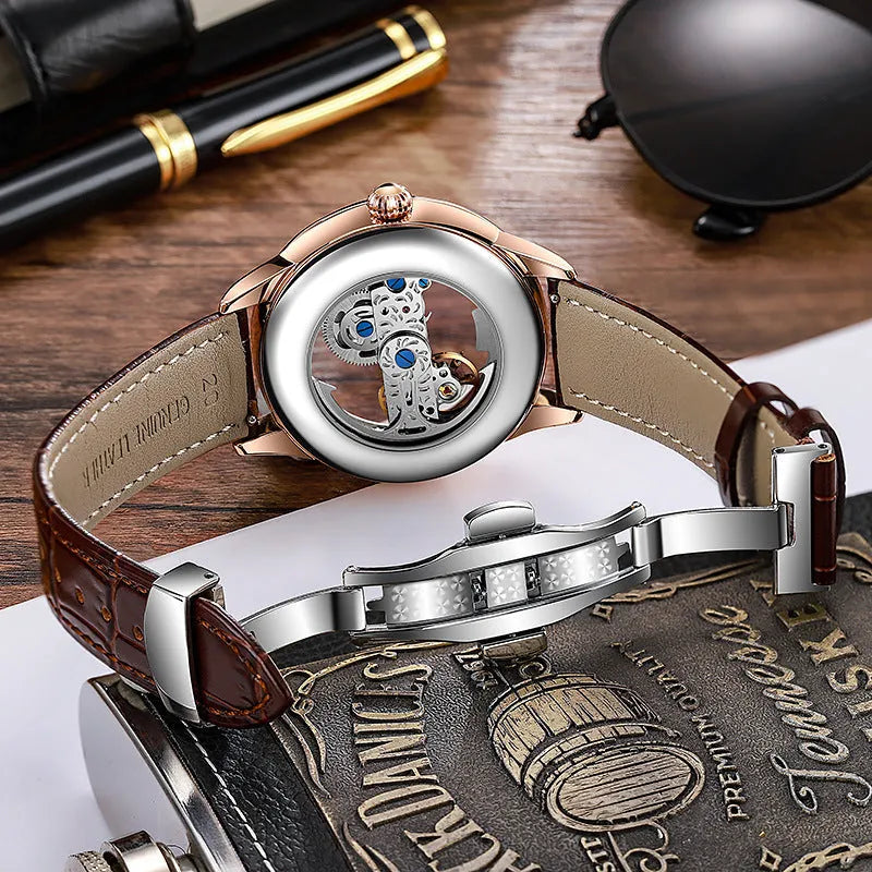 Men's luxury zircon mechanical watch with onion crown on a black leather strap, showing transparent case back.