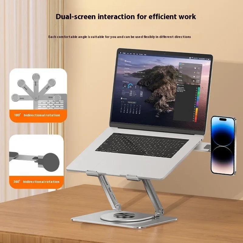 Silver carbon steel laptop stand in rotated position with a magnetic phone holder attached to the side.