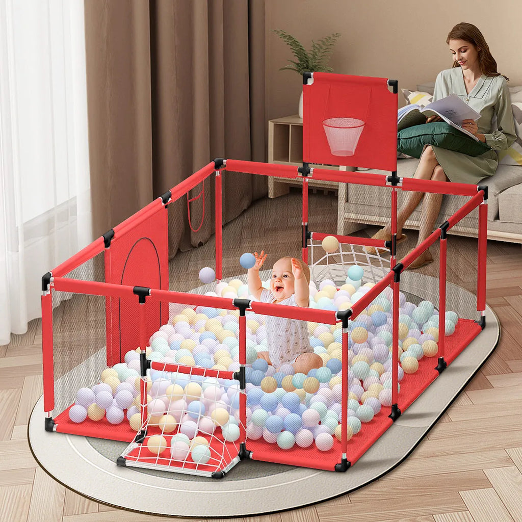 A large dark grey children's playpen tent with a stainless steel frame set up indoors.