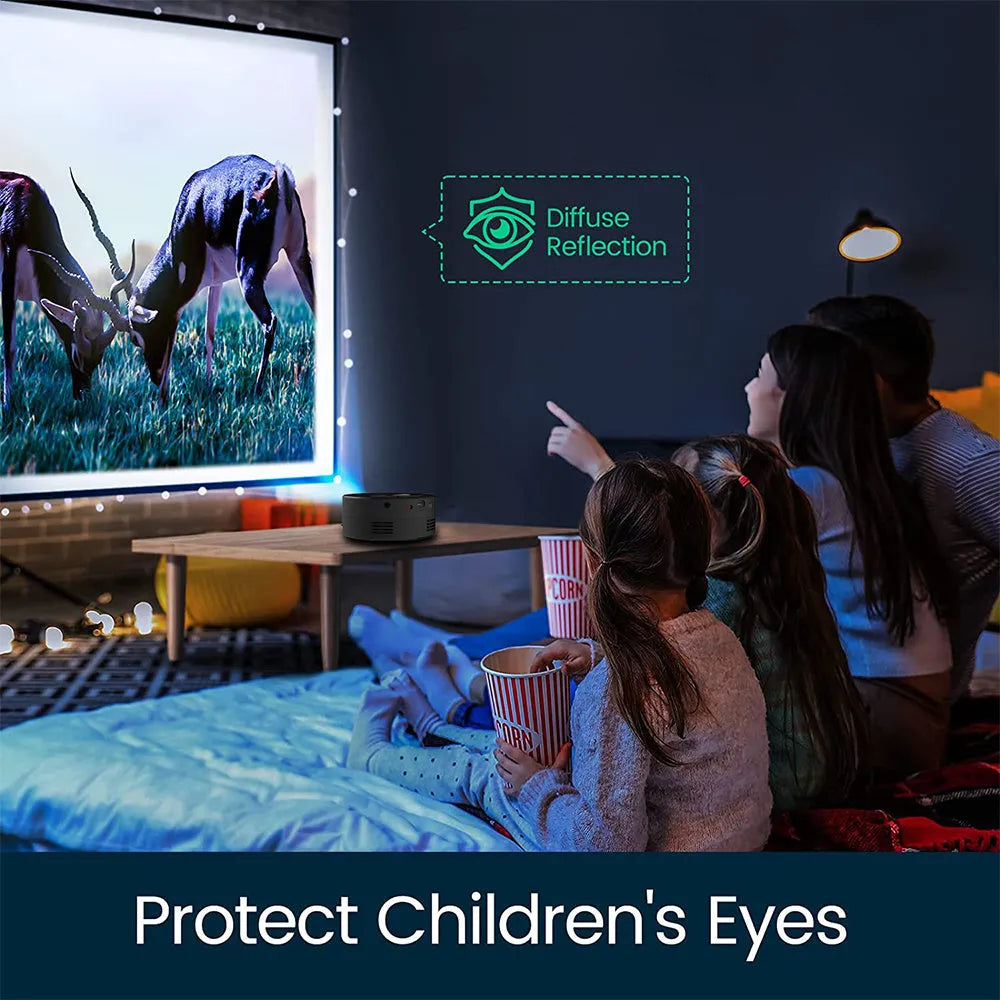 Black portable children's home projector for mobile phone connection on a surface