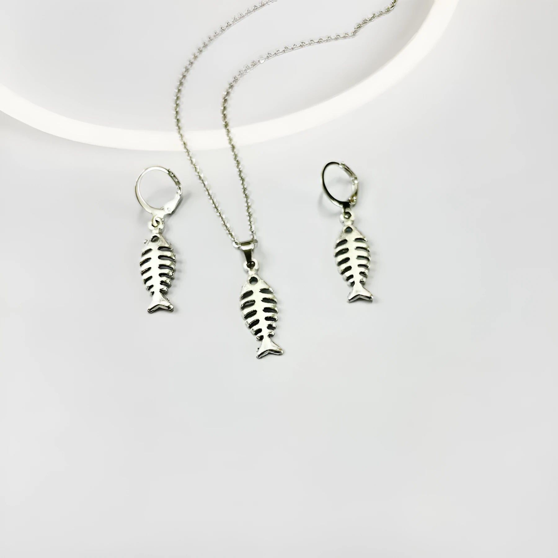 Women's fishbone pendant necklace and matching earrings set with adjustable O-chain