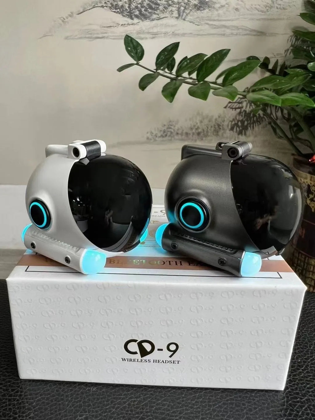 Clip-on wireless Bluetooth sports headset in black showing attachment mechanism and compact design