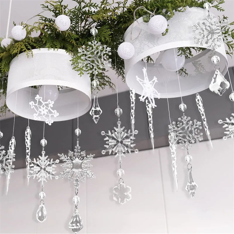 Set of ten clear acrylic icicle and snowflake Christmas ornaments with white hanging ribbons.