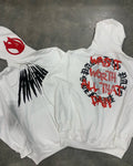 Black loose hooded sweatshirt with white skull and letter print decorated with silver rhinestones.