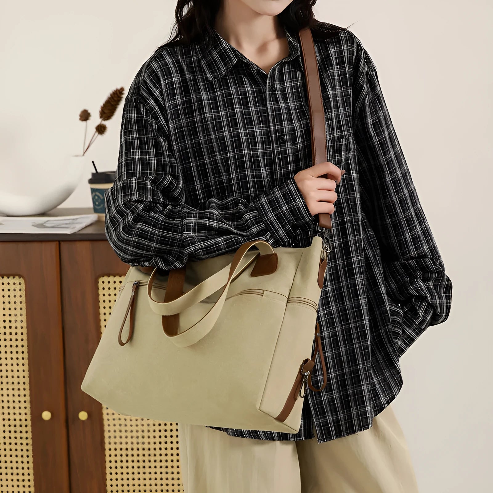 Retro style soft canvas shoulder bag for women in a horizontal square shape with internal organisers.