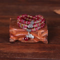 Handmade natural watermelon crystal bracelet with Chinese knot fastening and geometric beads