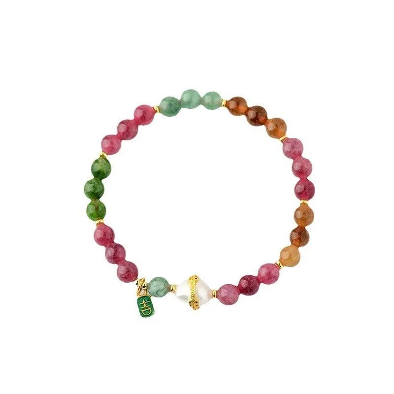 Geometric chalcedony bracelet with 6.5mm beads and natural crystal construction