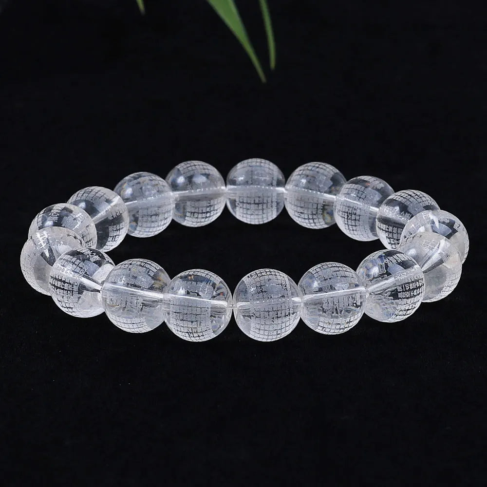 10mm glass Heart Sutra beads with polished surface showing clear script details