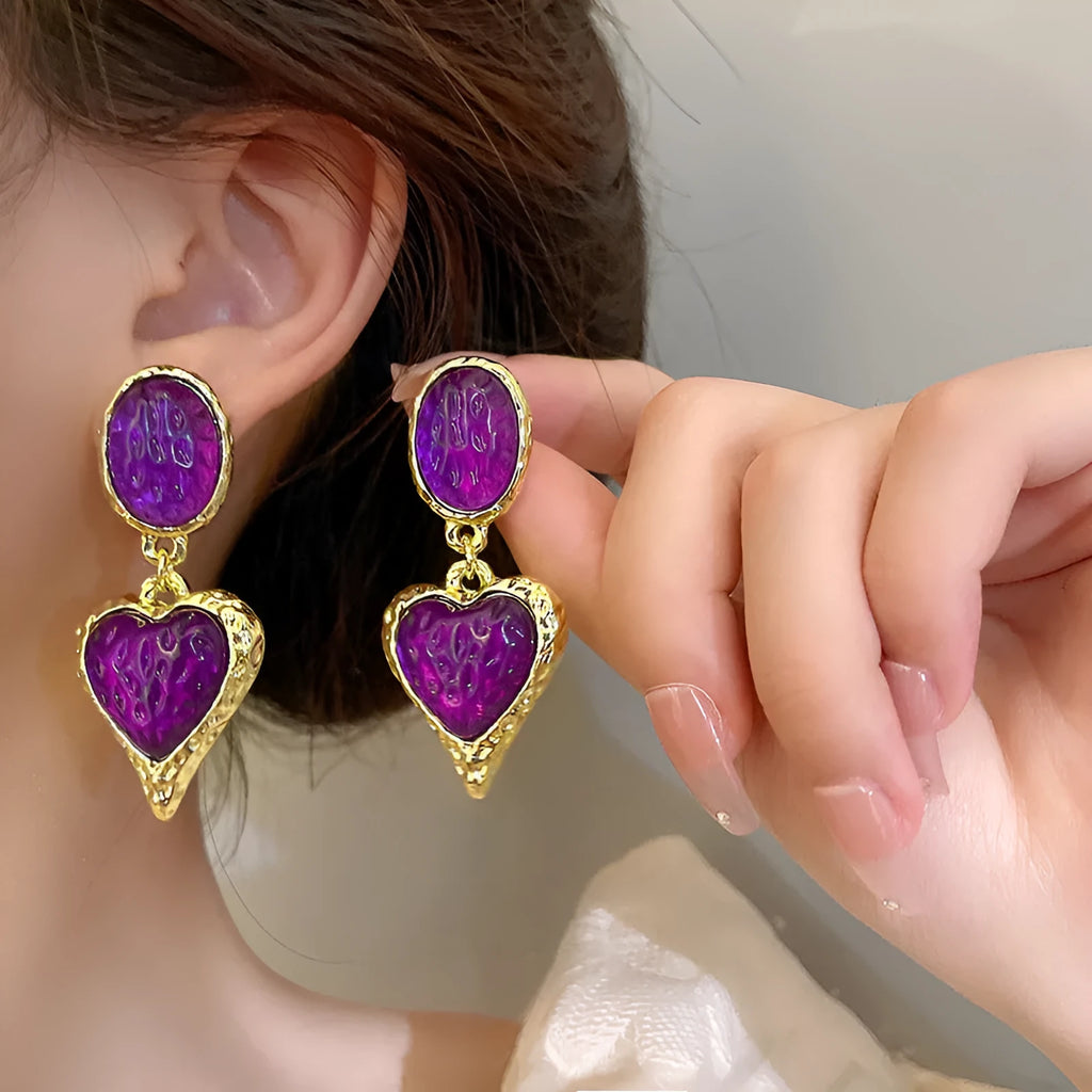 Oval love heart stud earrings with pleated texture in purple, red, green, and yellow white colours.