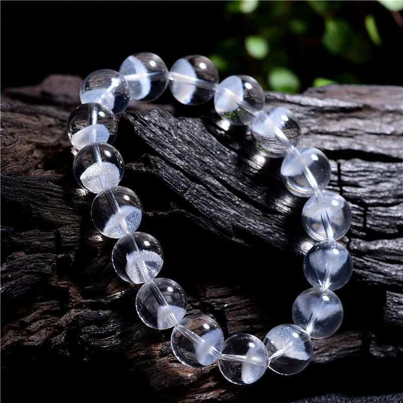 Women's natural white ghost pyramid bracelet with white crystal beads and a ruyi charm