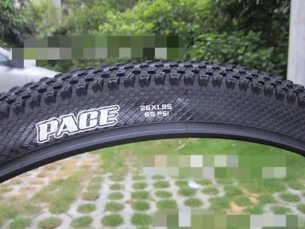 Mountain bike ultralight puncture-resistant tyre showing tread pattern and sidewall with size options