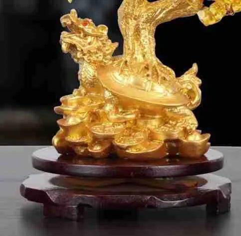 Resin Feng Shui ornament of a citrine small water turtle money tree, Chinese style.
