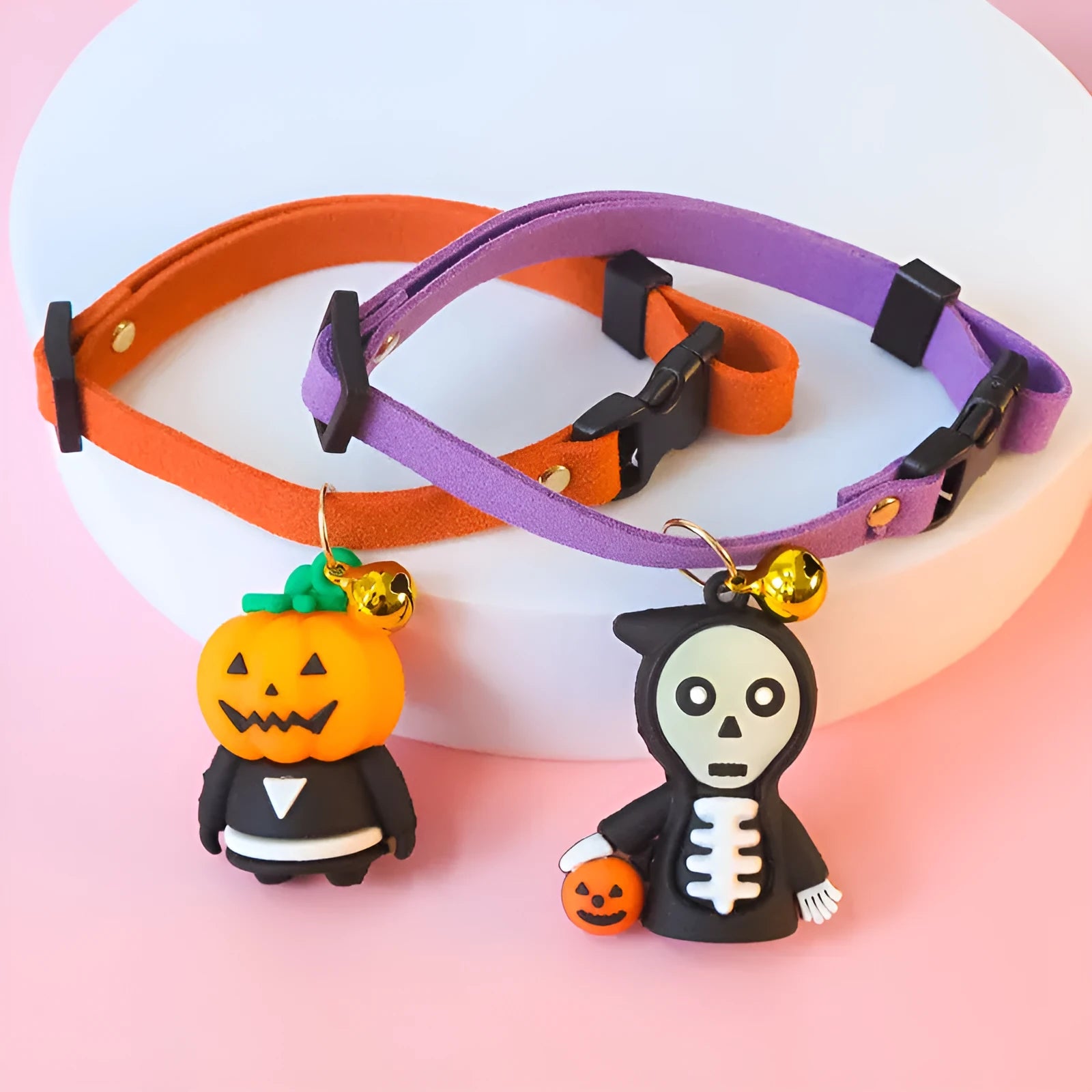 Halloween dog collar with luminous pumpkin man, brat and skull designs in adjustable polyester construction