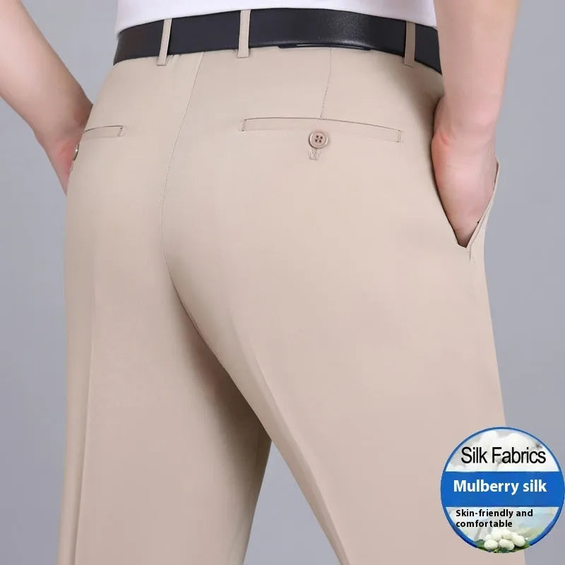 Men's straight-leg suit trousers in a mulberry silk blend fabric, shown in dark blue on a hanger.