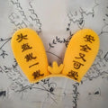 Rabbit glow ears and locomotive themed ski helmet ornament with a Velcro backing.