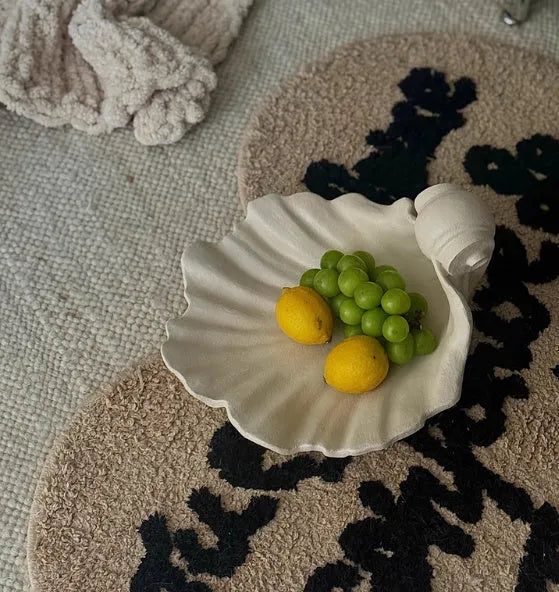 White resin simulation shell fruit plate ornament decoration on table