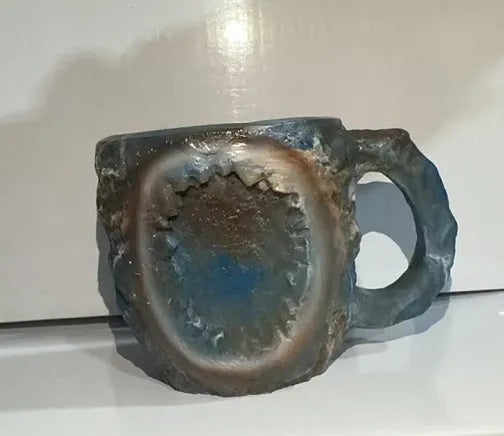 Purple resin mineral crystal coffee mug with handle showing 3D texture and 10cm height