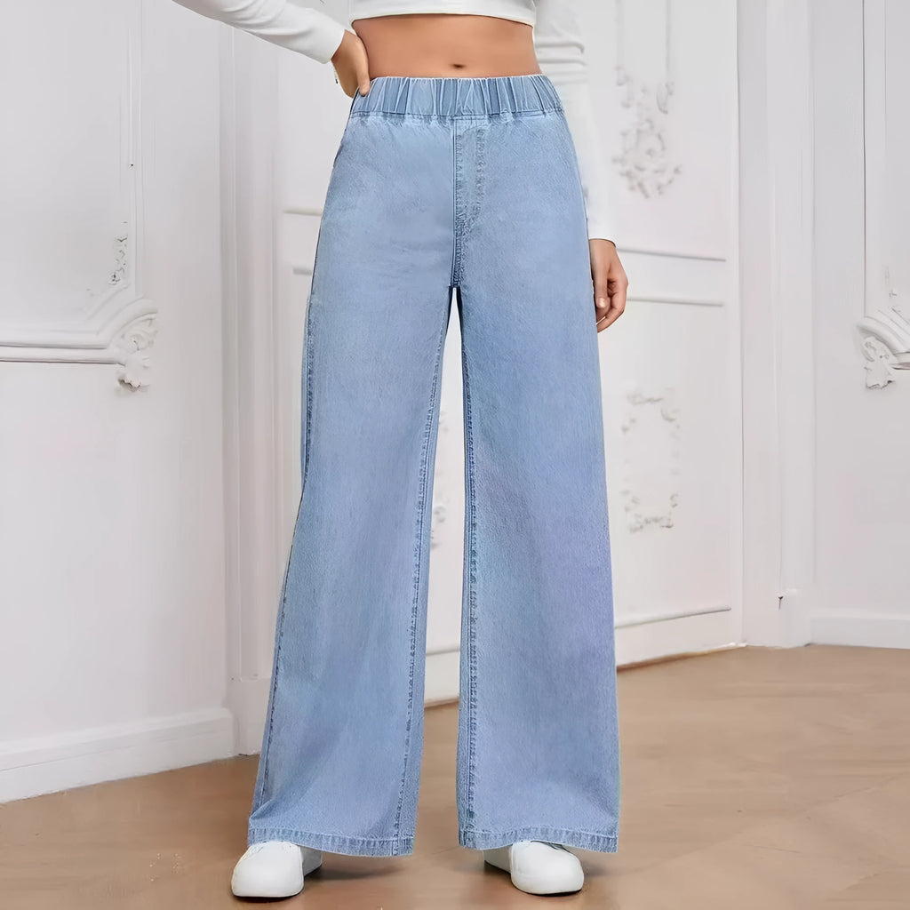 Light blue washed wide-leg straight jeans on a hanger, showing mid waist and zip fly detail.