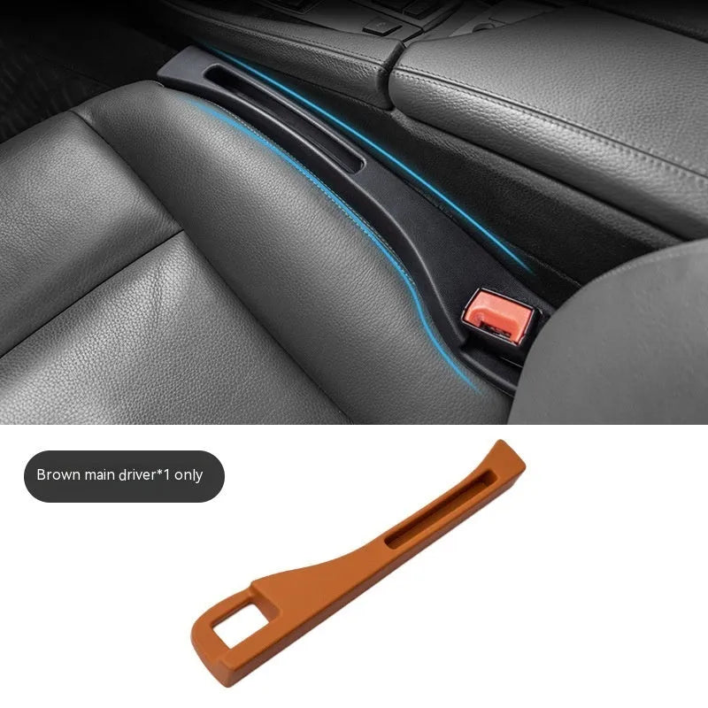 Black car seat gap storage box organiser with handle placed between vehicle seats