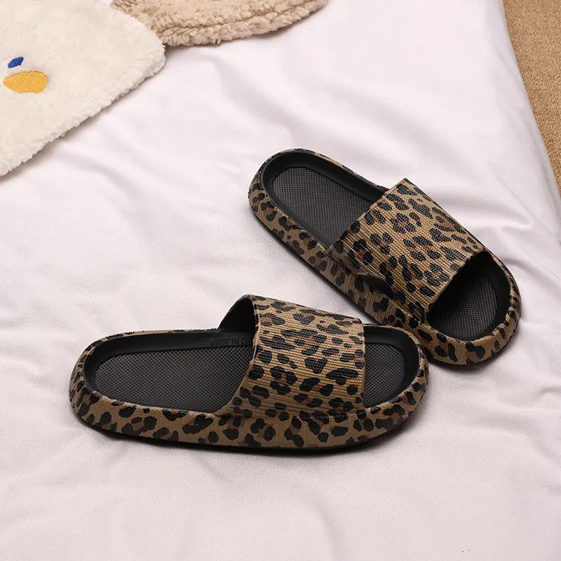 Women's leopard print EVA slippers with thick sole on a white background