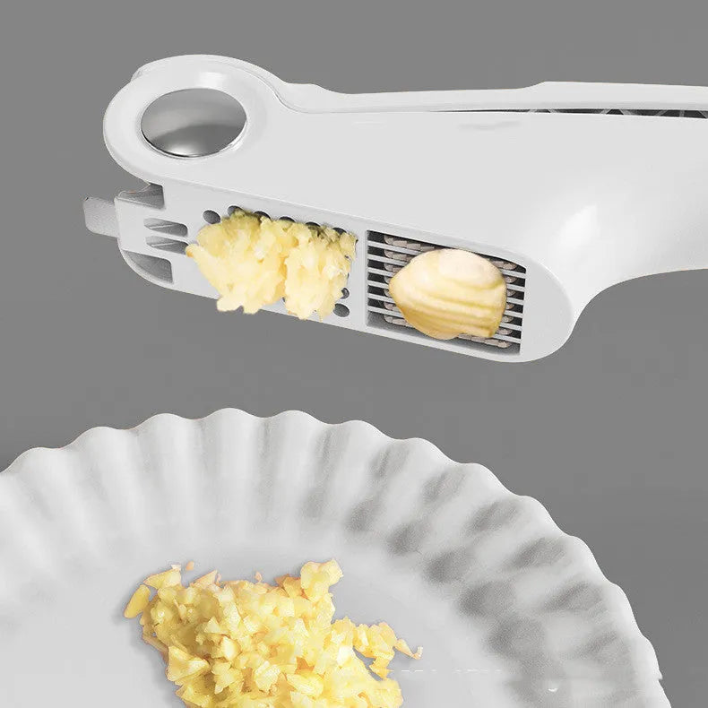 Manual garlic press kitchen tool in white colour with stainless steel components measuring 22cm