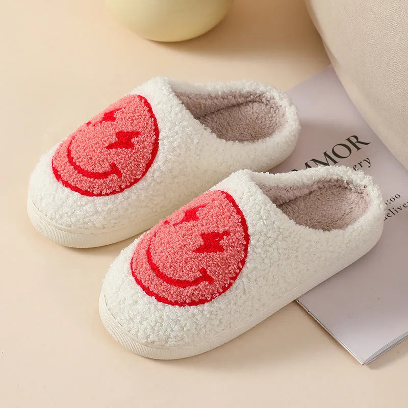 Women's plush cartoon love style home slippers in multiple colours with a non-slip PVC sole.