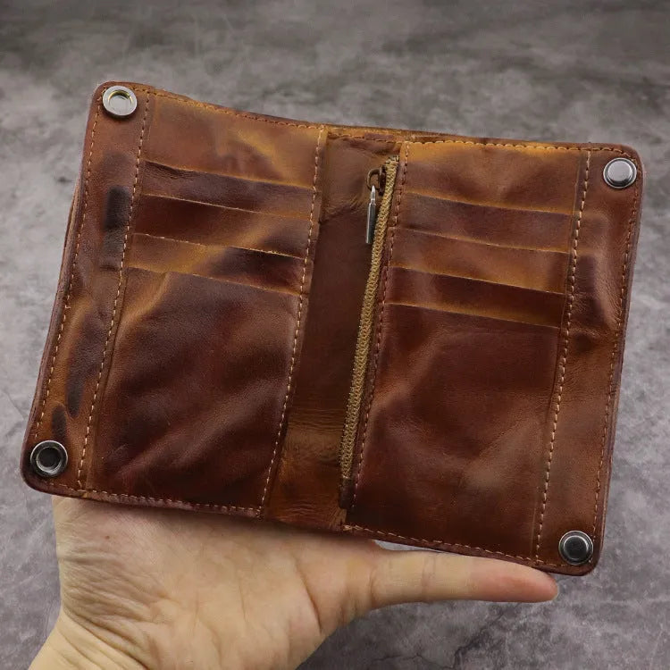 Men's retro brown genuine leather vertical wallet open showing card slots and coin pocket.
