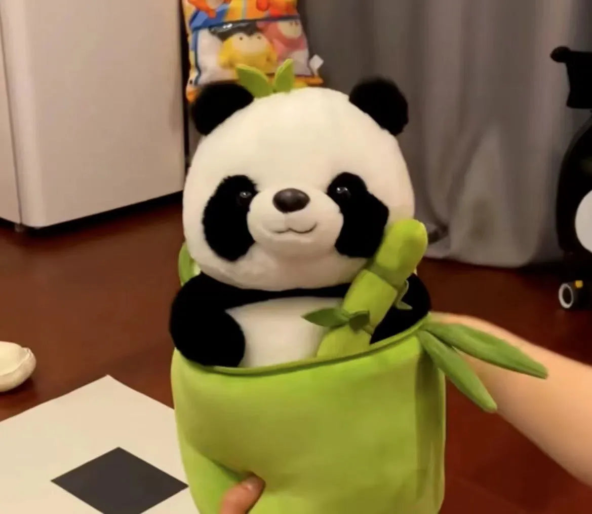 Black and white panda plush doll holding green bamboo tube, soft toy with PP cotton filling