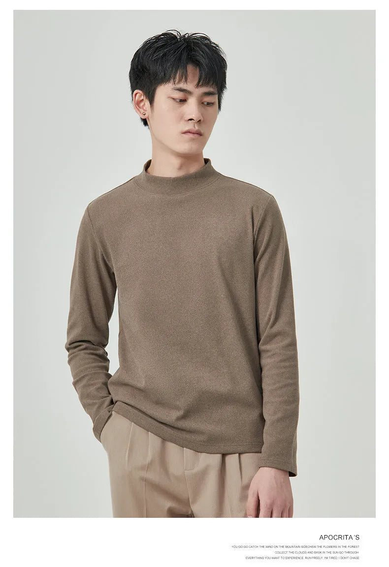 Man wearing a beige half-high collar long-sleeved T-shirt for casual autumn winter wear