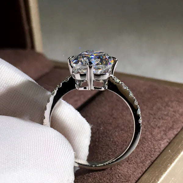 Women's moissanite four-prong princess cut ring in white gold colour on copper band, size no.7