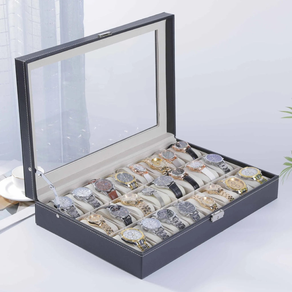Grey leather watch storage box with transparent dustproof lid showing multiple watch slots inside