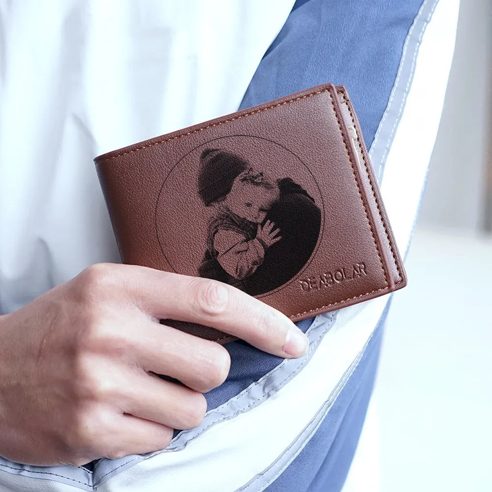 Men's brown leather zip wallet presented in gift packaging