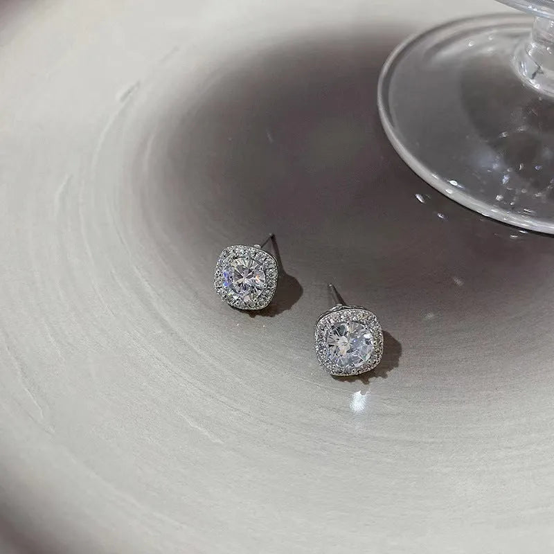 Women's square geometric alloy earrings with diamond-treatment finish in silver colour.