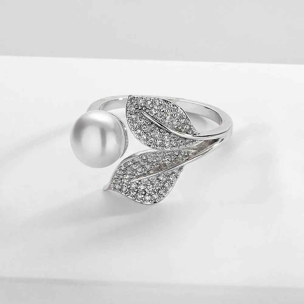 Exquisite Leaf Zircon Open Ring with silver-tone leaf motif and cubic zirconia stones on adjustable band