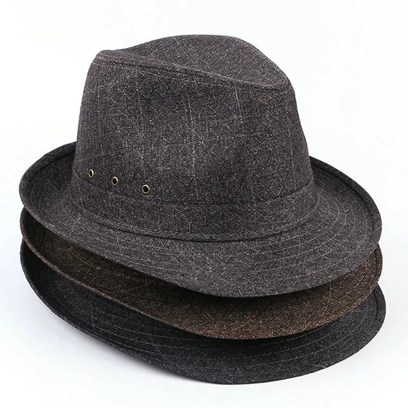 A thickened wool fedora hat for men in classic grey, shown in a side profile to highlight its centre pinch and band.