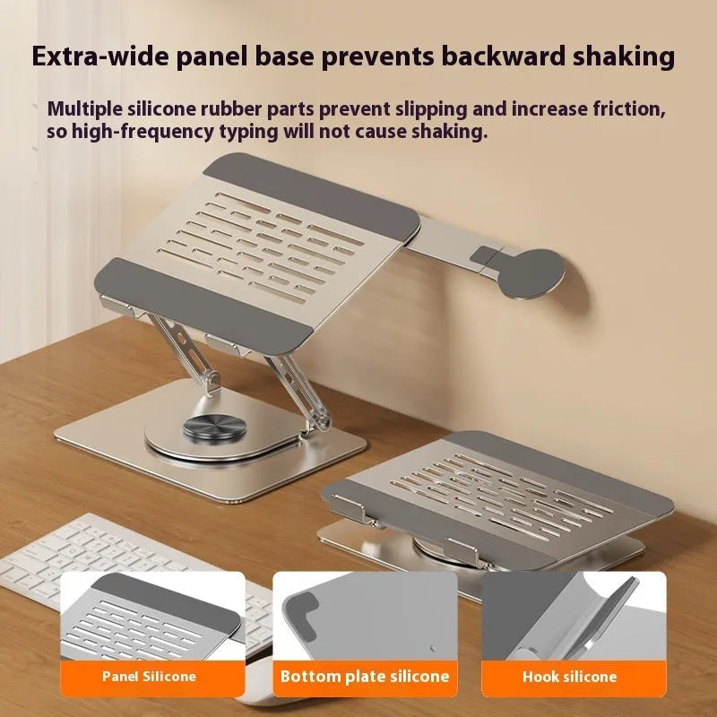 Silver carbon steel laptop stand in rotated position with a magnetic phone holder attached to the side.