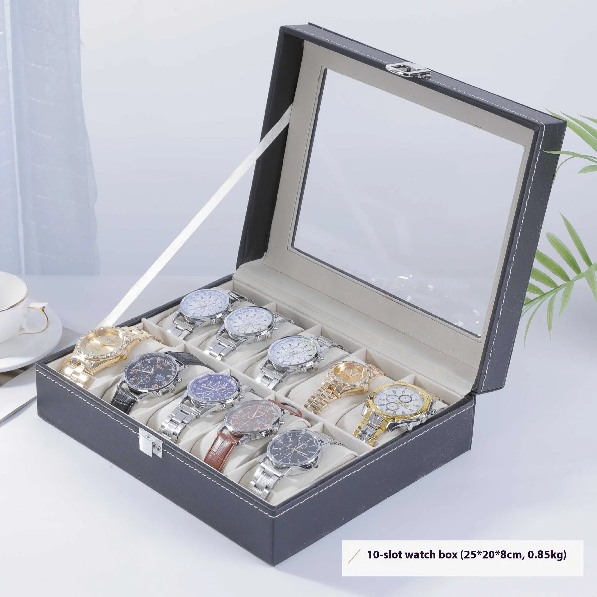Grey leather watch storage box with transparent dustproof lid showing multiple watch slots inside