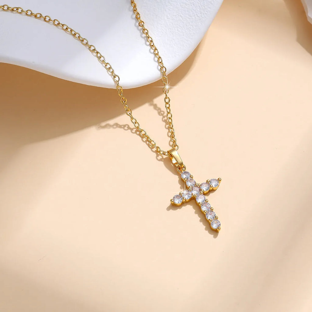 Gold plated cross necklace for women with cubic zirconia stones on a 45 cm chain, shiny finish