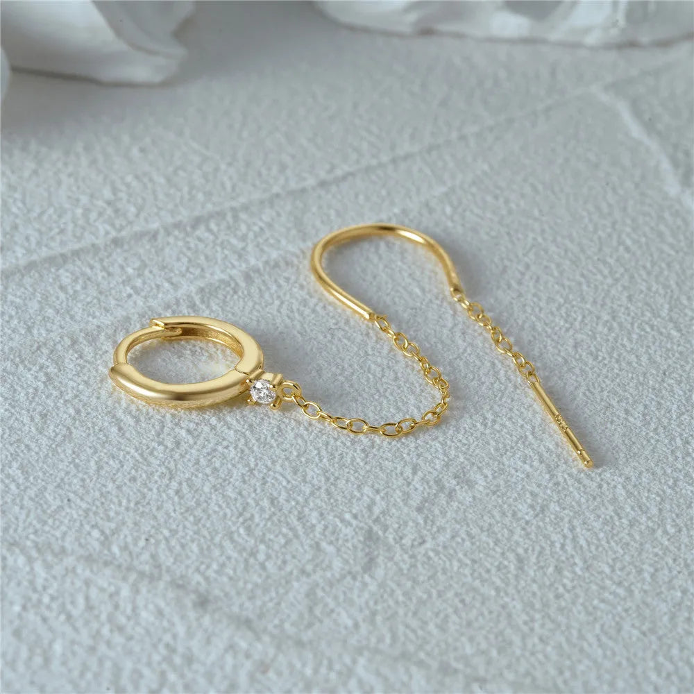 S925 sterling silver geometric stud earrings with gold electroplated flower, tassel, and chain design.