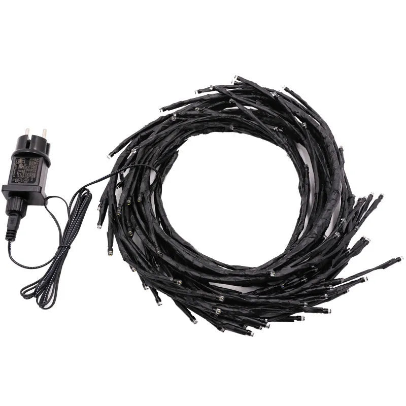 Warm white LED rattan tree light for indoor room and wall decoration.